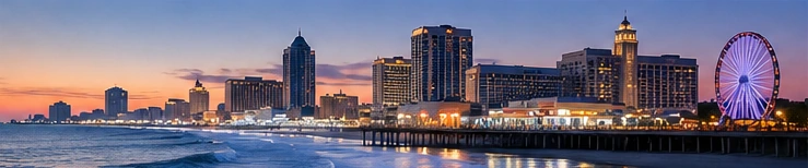 Atlantic City coastal casino hotels and boardwalk skyline in evening light